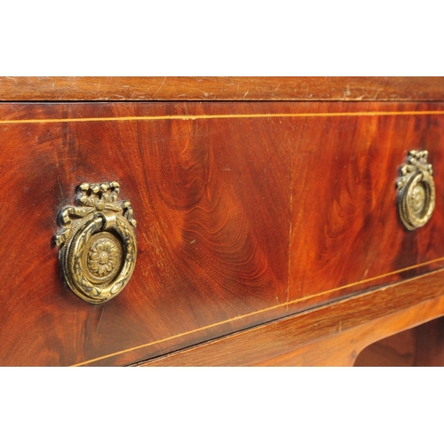 1016 - An early 20th century Edwardian mahogany writing table desk. The writing table raised on tapered squ... 