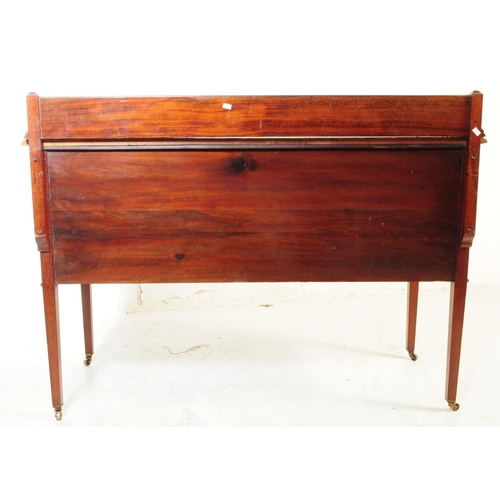 1016 - An early 20th century Edwardian mahogany writing table desk. The writing table raised on tapered squ... 