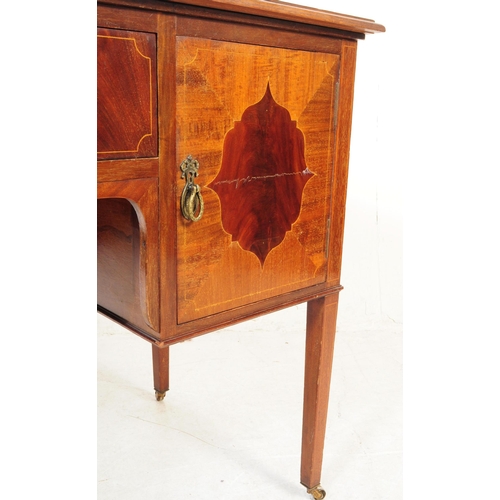 1016 - An early 20th century Edwardian mahogany writing table desk. The writing table raised on tapered squ... 