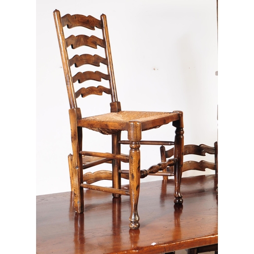 1018 - Banks of Bristol - A 20th century banks of bristol oak dining table and chairs. The table raised on ... 