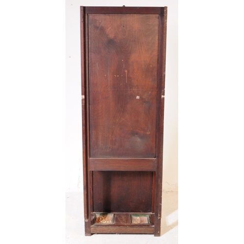 1020 - An early 20th century circa 1930s/1940s oak wood hall stand. The hall stand of rectangular form, wit... 