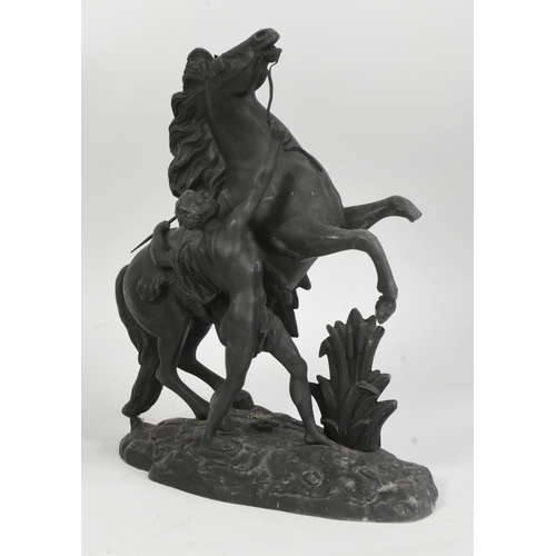 1027 - A pair of 19th century Victorian era spelter marley horse figures. The horses being modelled rearing... 