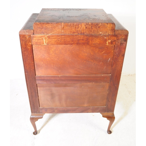 1028 - A 1930s Art Deco walnut chest of drawers. The chest having a series of five drawers, each with bar h... 