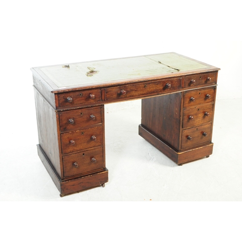 1030 - A 19th century Victorian mahogany twin pedestal writing desk. The desk having green gilt tooled leat... 