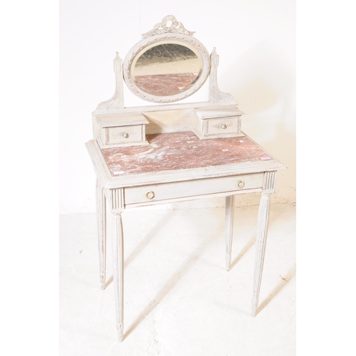 1045 - A Louis XVI style marble topped mirror back dressing table. The dressing table raised on tapered flu... 