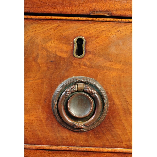 1049 - A 19th century George III bow front mahogany chest of drawers. The chest having a four drawer config... 