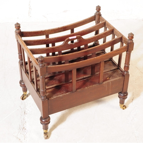 1050 - A Victorian 19th century mahogany Canterbury bookcase / magazine rack stand. Having pierced heart to... 