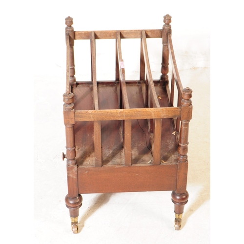 1050 - A Victorian 19th century mahogany Canterbury bookcase / magazine rack stand. Having pierced heart to... 