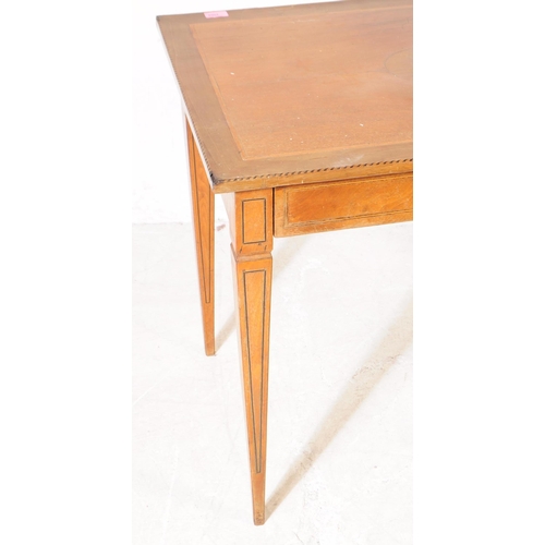 1053 - A late 19th Century Victorian walnut inlaid small writing table / side table. Of rectangular form ra... 