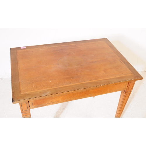 1053 - A late 19th Century Victorian walnut inlaid small writing table / side table. Of rectangular form ra... 