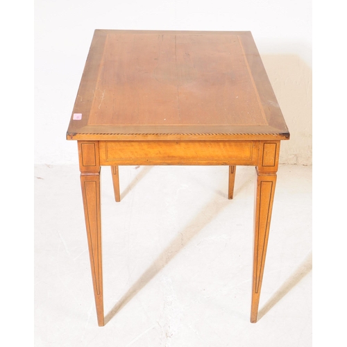 1053 - A late 19th Century Victorian walnut inlaid small writing table / side table. Of rectangular form ra... 