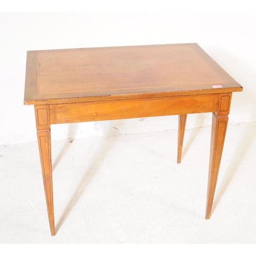 1053 - A late 19th Century Victorian walnut inlaid small writing table / side table. Of rectangular form ra... 