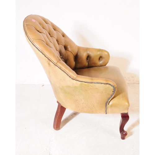 1057 - Chesterfield style - A 20th Century leather spoon back Chesterfield manner office / desk chair. The ... 