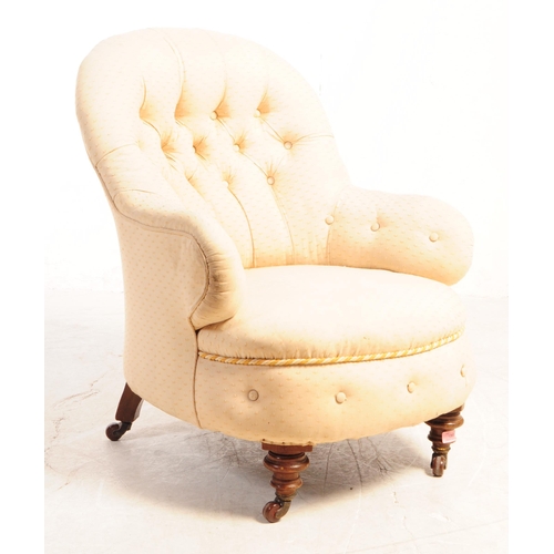 1060 - A 19th century Victorian nursing chair. The chair having tufted button spoon back and being upholste... 