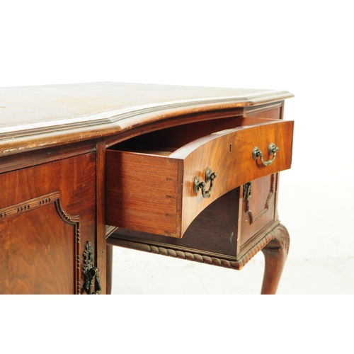 1063 - An early 20th Century circa 1920s Queen Anne Revival mahogany desk with leather inlay top. Desk havi... 