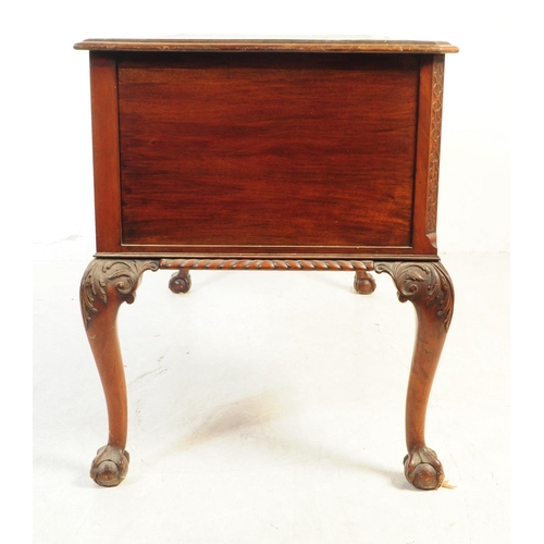 1063 - An early 20th Century circa 1920s Queen Anne Revival mahogany desk with leather inlay top. Desk havi... 