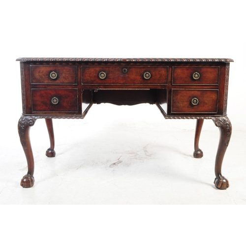 1064 - An early 20th Century Queen Anne Revival mahogany writing desk / dressing table with leather inlay t... 