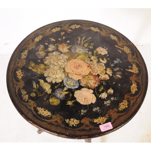 1065 - A small 19th Century painted black Napoleon III side table having circular top with decorative flora... 