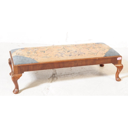 1070 - An early 20th century Edwardian mahogany two seater piano / foot stool. The stool raised on short ca... 