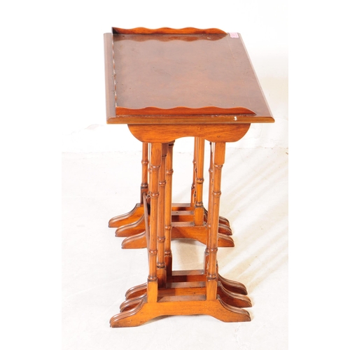 1071 - An early 20th century Edwardian repro mahogany inlaid nest of side tables. The tables each having to... 