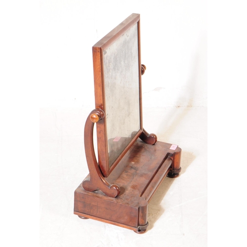 1076 - A 19th Century Victorian mahogany veneer swing toilet mirror. The rectangular mirror having splayed ... 