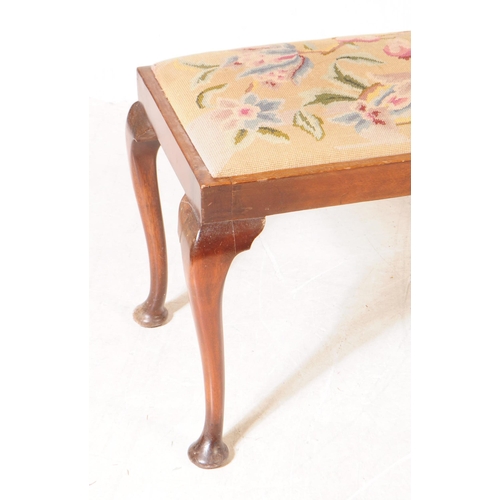 1084 - A 1930s 20th century piano duet needlepoint upholstered footstool with another. The larger footstool... 