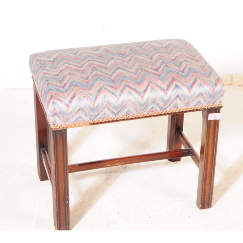 1084 - A 1930s 20th century piano duet needlepoint upholstered footstool with another. The larger footstool... 