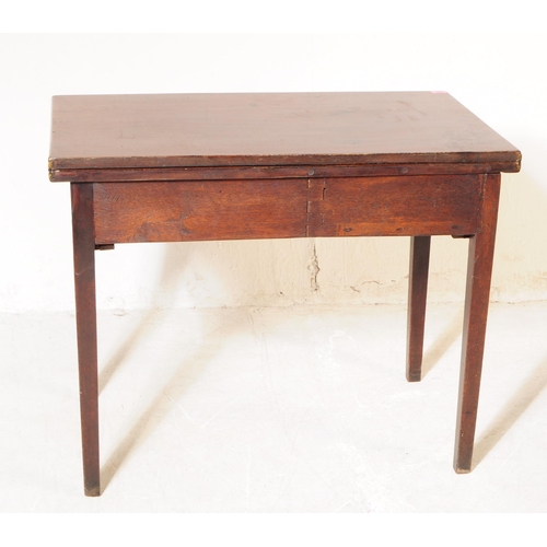 1093 - A 19th century George III mahogany fold over tea table. The desk having rectangular top over drawers... 