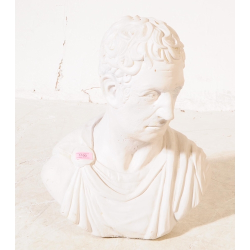 1100 - A large 20th century composite bust modelled in the form of a Roman emperor with robes clasped by fi... 