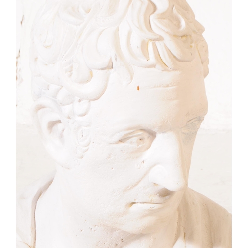 1100 - A large 20th century composite bust modelled in the form of a Roman emperor with robes clasped by fi... 