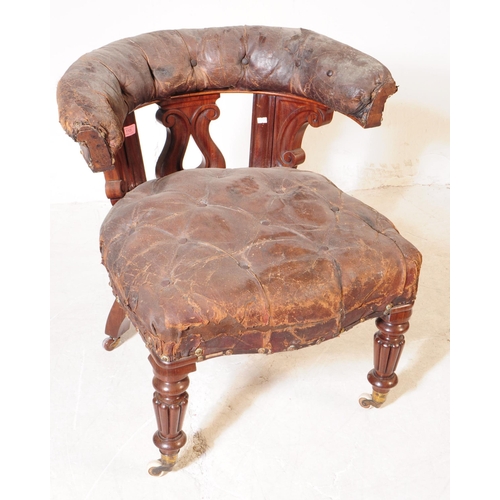 1105 - A 19th century mahogany cockfighting bow chair having a tufted leather top rail over carved lyre sha... 