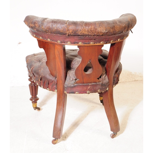 1105 - A 19th century mahogany cockfighting bow chair having a tufted leather top rail over carved lyre sha... 