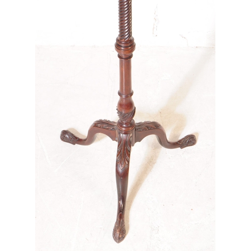 1109 - A 19th century Victorian mahogany pedestal torchere. The torchere having wrythen twist type pedestal... 