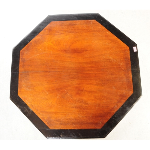 1111 - A 19th century Victorian Aesthetic era mahogany and ebonised wood octagonal centrepiece table. The t... 