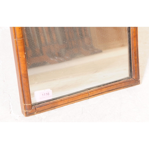 1116 - A 1930s Queen Anne Revival walnut table top vanity easel mirror. The mirror having crested top with ... 