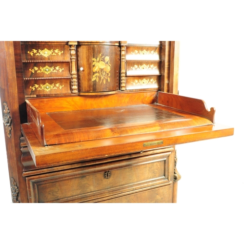 1124 - A 19th century Biedermeier walnut secretaire abittant desk. The secretaire raised on turned bun feet... 