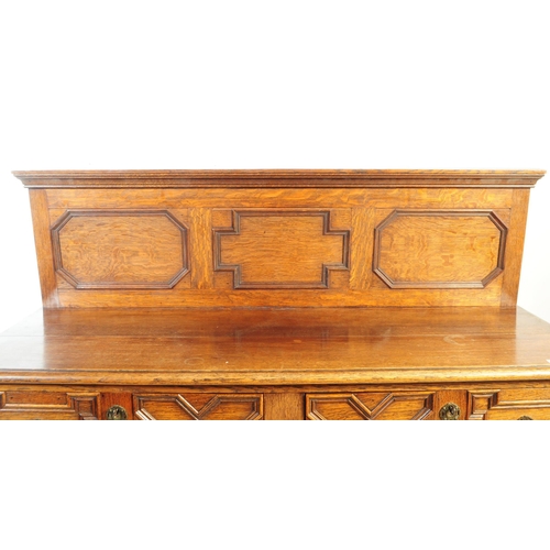 1127 - An early 20th century 1930s Oak wood Jacobean revival buffet sideboard. The buffet having two cupboa... 