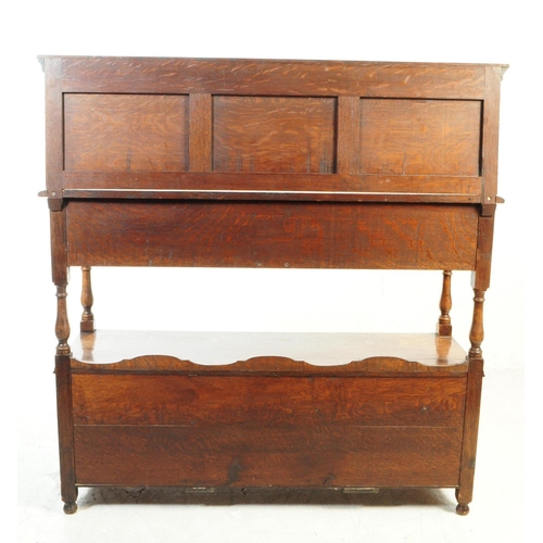 1127 - An early 20th century 1930s Oak wood Jacobean revival buffet sideboard. The buffet having two cupboa... 