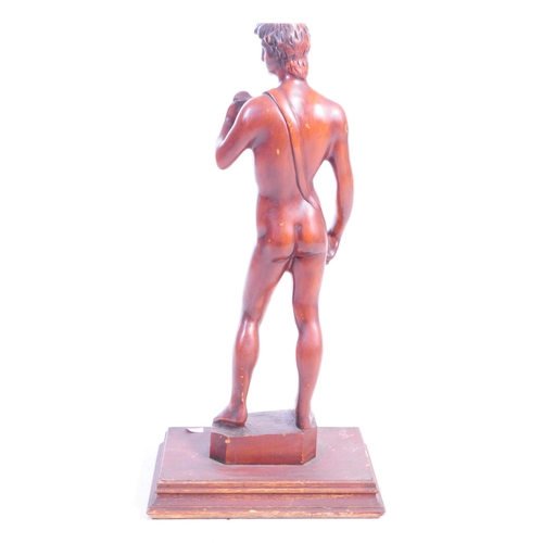 1130 - A large 20th Century carved wood David by Michelangelo sculpture / figure upon stepped square base. ... 