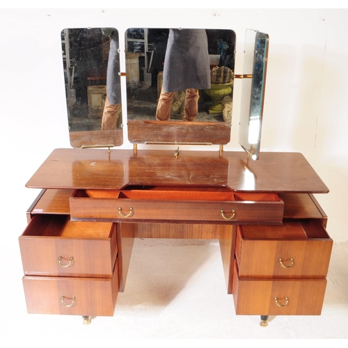 551 - G-Plan - Librenza Range - A mid 20th century G-Plan Librenza range Tola wood dressing table with sto... 