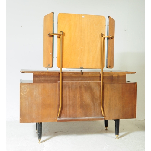 551 - G-Plan - Librenza Range - A mid 20th century G-Plan Librenza range Tola wood dressing table with sto... 