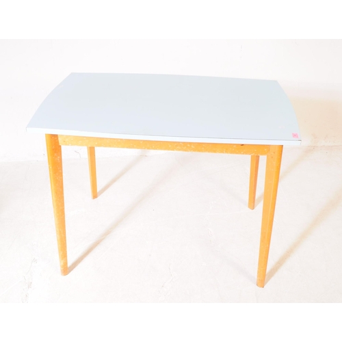 555 - A vintage mid 20th century blue Formica top kitchen / dining table. Rectangular form with angled tap... 