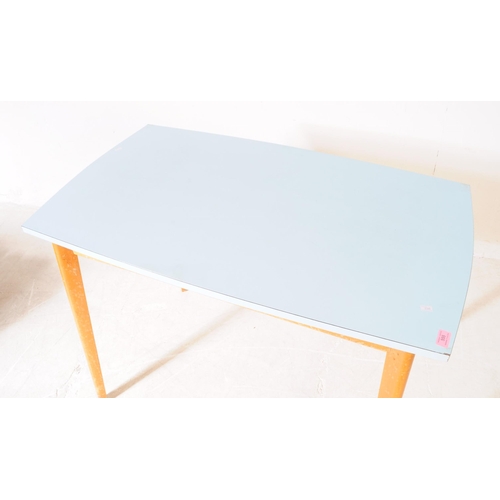 555 - A vintage mid 20th century blue Formica top kitchen / dining table. Rectangular form with angled tap... 