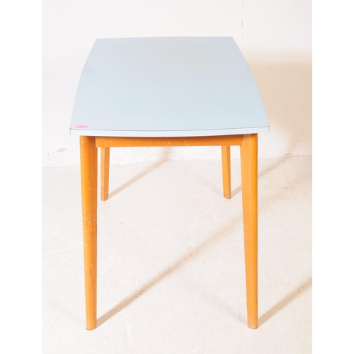 555 - A vintage mid 20th century blue Formica top kitchen / dining table. Rectangular form with angled tap... 