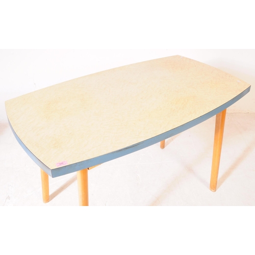 560 - British Modern Design - A mid 20th century formica topped kitchen dining table. The table raised on ... 