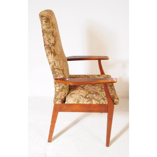 565 - Parker Knoll - A mid 20th century Parker Knoll PK 928/9 lounge armchair. The chair having shaped woo... 