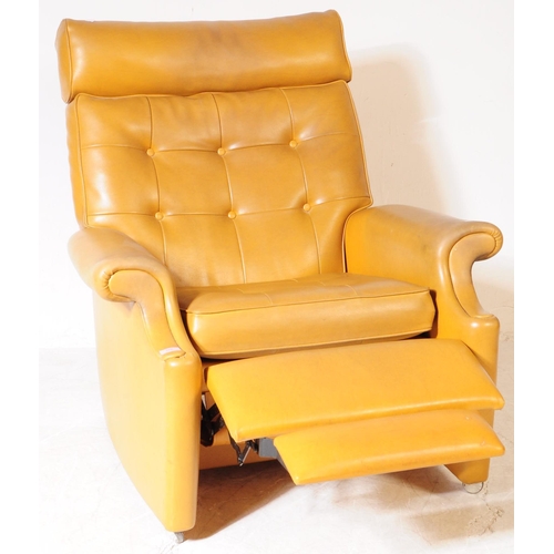 566 - Parker Knoll - A mid 20th century Parker Knoll model N30 tan leather reclining armchair. The armchai... 