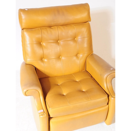 566 - Parker Knoll - A mid 20th century Parker Knoll model N30 tan leather reclining armchair. The armchai... 