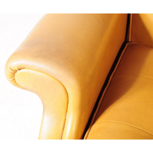 566 - Parker Knoll - A mid 20th century Parker Knoll model N30 tan leather reclining armchair. The armchai... 