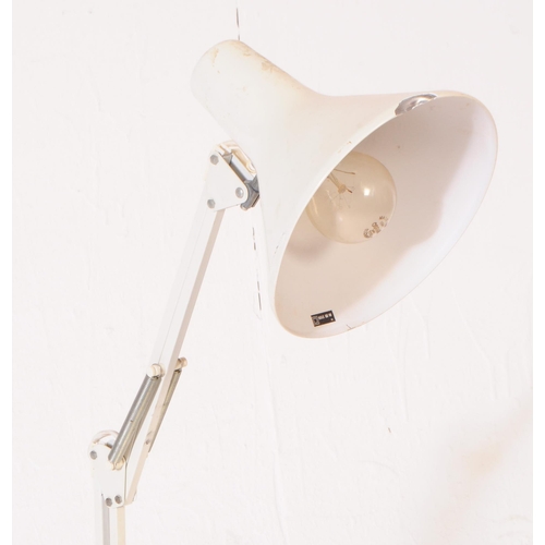 578 - A Anglepoise influenced mid century spring loaded desk top lamp, Dual arm construction finished with... 